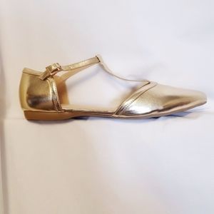 N.Y.L.A. gold t-flats